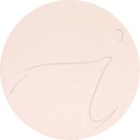 Ljus, pressad puderfoundation i cirkel.