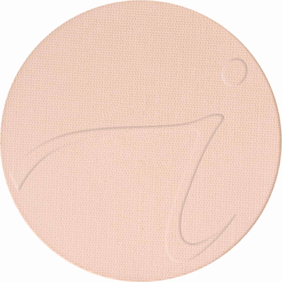 Ljus, rund makeup-puder refill.